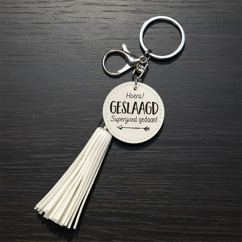 TASSEL GESLAAGD SLEUTELHANGER